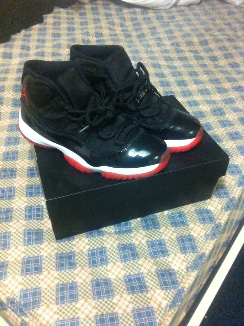 Image of Nike air jordan bred 11 vvnds size uk7