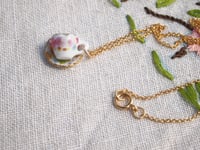 Image 4 of gold lattice cup and saucer necklace