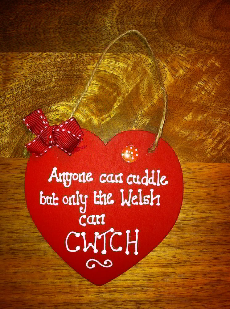 Image of 'Anyone can cuddle but only the welsh can CWTCH' wooden heart sign