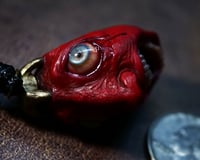Image 7 of Egg of the King bleeding eyes pendant, adjustable cord, OOAK,