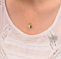 Image 1 of green and gold cup necklace
