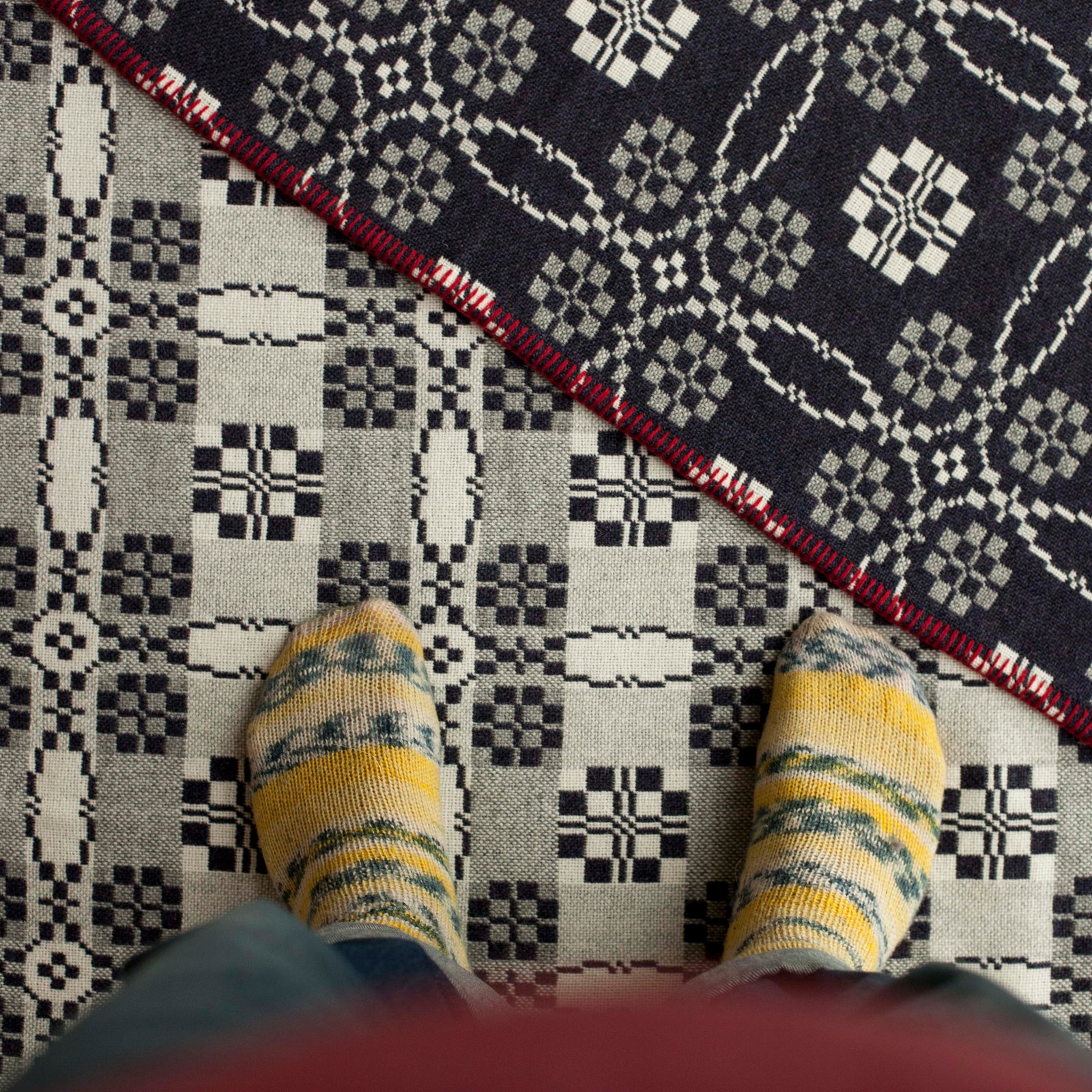Welsh wool coldatnight blanket in charcoal — fforest general stores