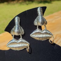 Image 1 of NOSE AND PIERCED LIP DANGLE EARRINGS