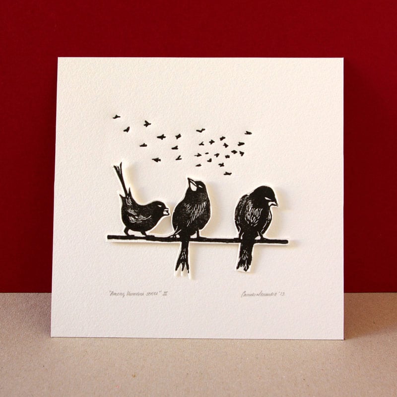 Image of Original linocut print of three free black birds and flying birds