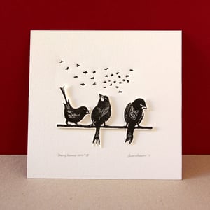 Image of Original linocut print of three free black birds and flying birds