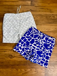 Image 2 of 3 Tanks + 2 Swim Trunks