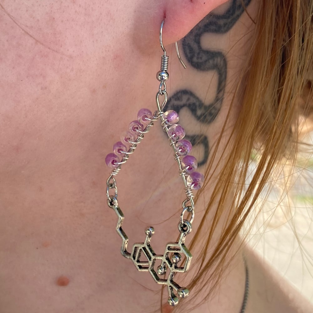 Image of purple thc chemical formula earrings