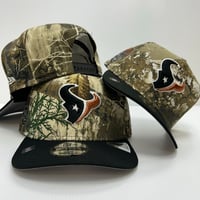 Image 1 of New Era 9Fifty A-Frame Pre Curved Real Tree Texans 🤘