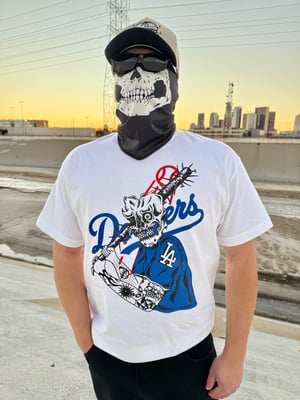 Image of bleed blue T