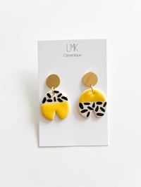Paire de boucles d'oreilles céramique TOTEM PATA jaune