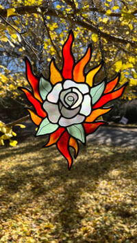 Image 2 of white rose in flames
