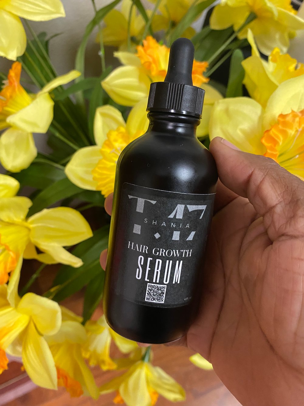 Image of Shania T.17  4 Fl. oz (Potent Serum) to add to all your hair care routine products 