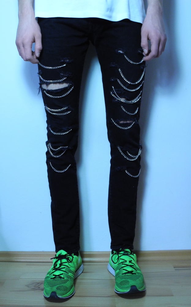 Image of Chain embellished distressed jeans 
