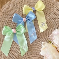 Image 3 of Pastel initial bows 