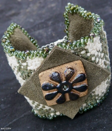 Image of SALE! Checkerboard Flower, handmade woven cuff with raku flower button