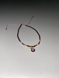 Image 1 of Purple evil eye bracelet 