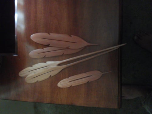 Image of handcrafted wooden feather hair sticks/bookmarks