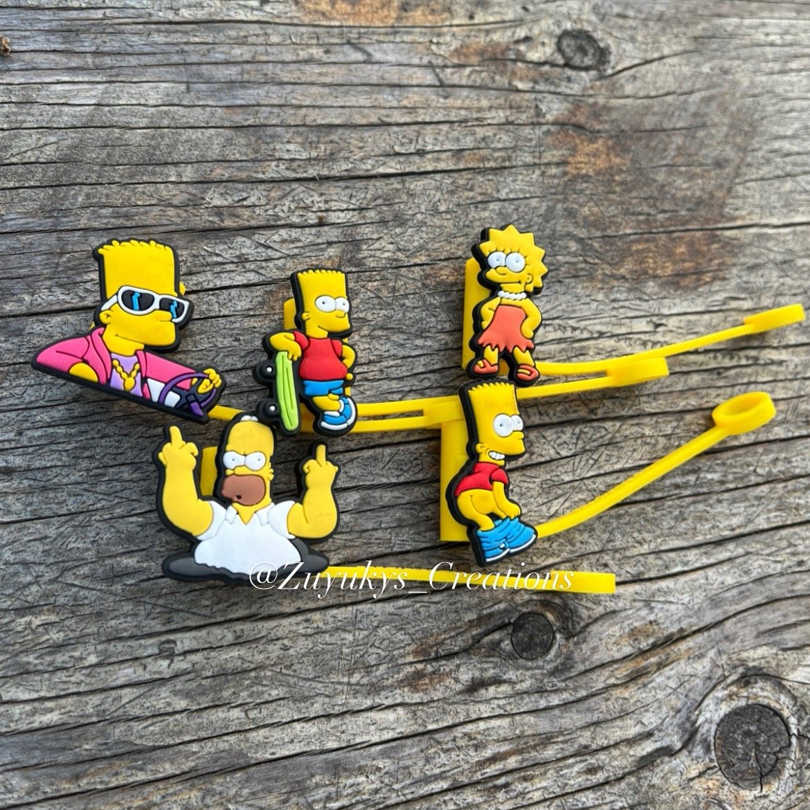 https://assets.bigcartel.com/product_images/1315712a-38cc-4ea2-a5c3-7ff2ebfa858f/simpsons-straw-toppers-set.jpg?auto=format&fit=max&w=1200