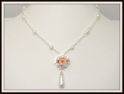 Image of Victorian Romantic Peach Ribbon Rose Mother Of Pearl And Peach Crystal Cream Glass Pearl Necklace