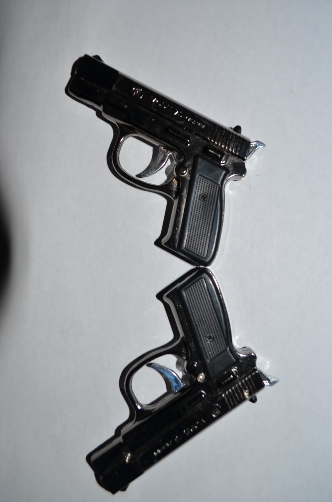 R2 Music Store — Gun Lighter + LED flashlight combo