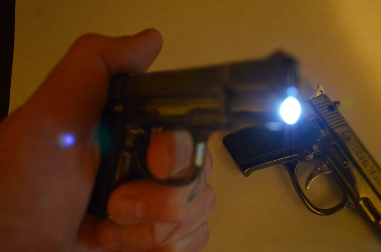 Image of Gun Lighter + LED flashlight combo