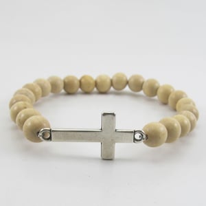 Image of Natural beaded stretch bracelet with sideways cross
