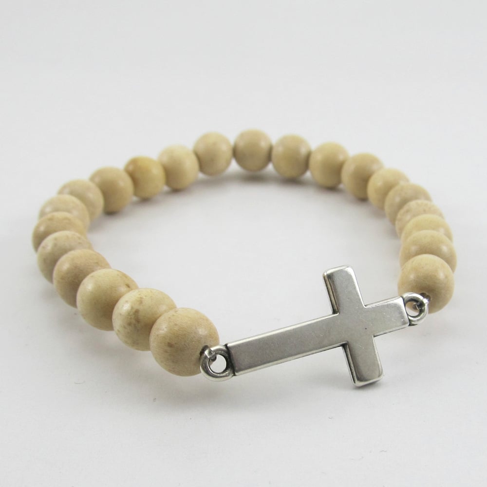 Image of Natural beaded stretch bracelet with sideways cross