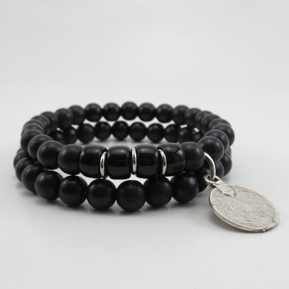 Image of Black double beaded bracelet with silver coin