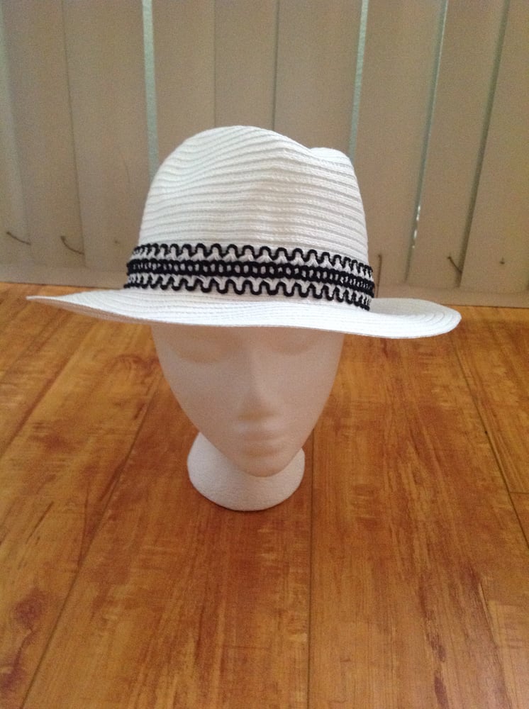 Image of White straw fedora with black and white trim