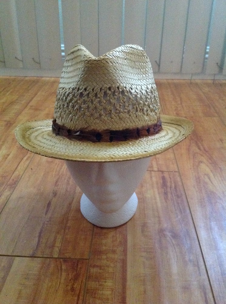 Image of straw fedora with brown feather