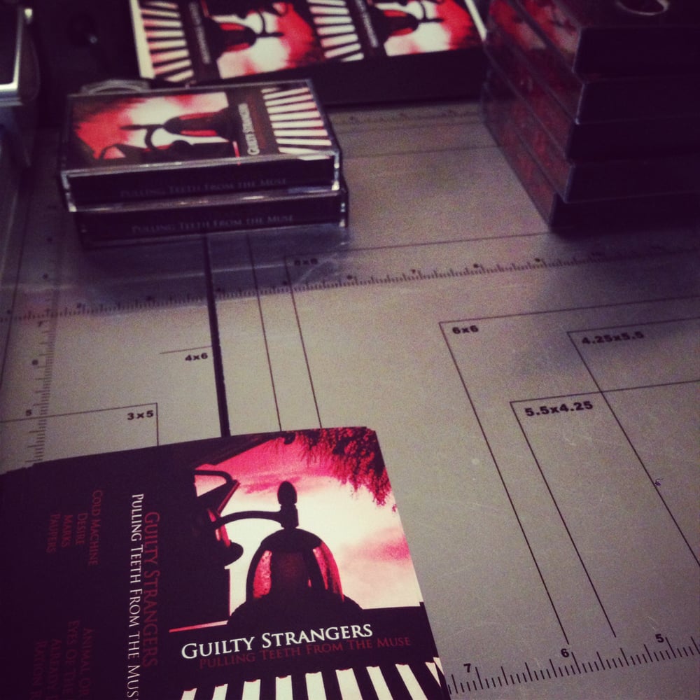 Image of Guilty Strangers "Pulling Teeth from The Muse" Cassette Tape