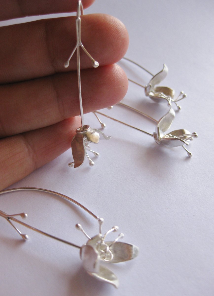 Jingle bell flower jewelry deals