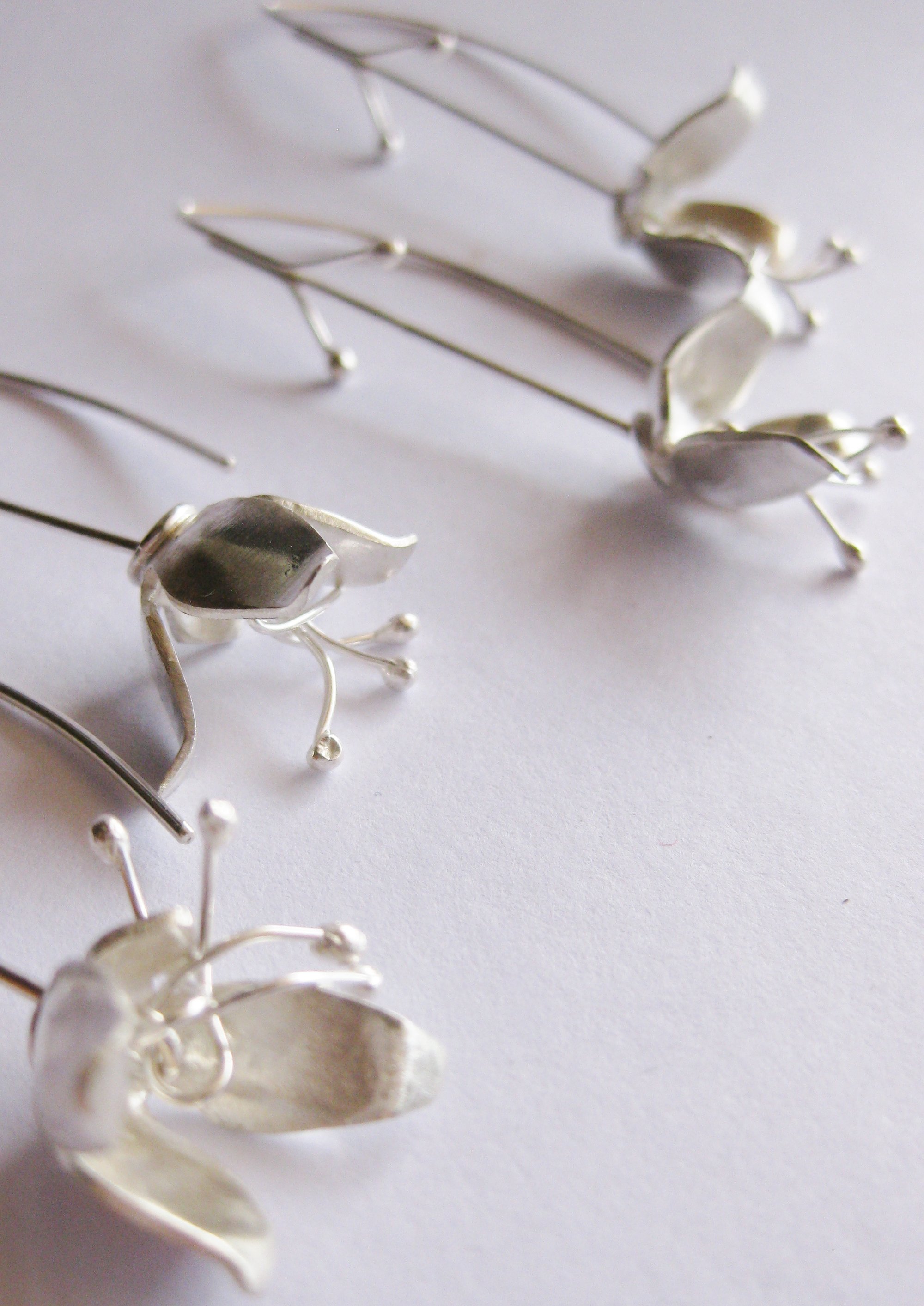Bell flower hook earrings in forged sterling silver