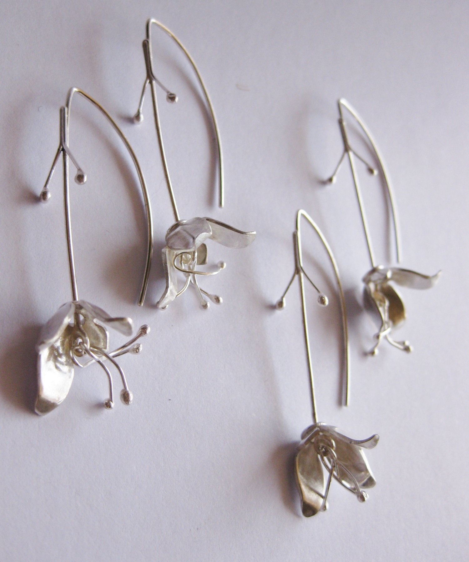 Bell flower hook earrings in forged sterling silver