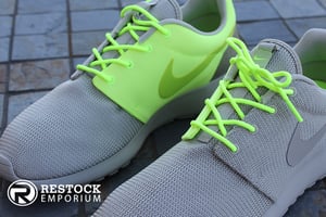 Image of Nike Roshe Run QS “Two-Faced” - Classic Stone & Squadron Green 