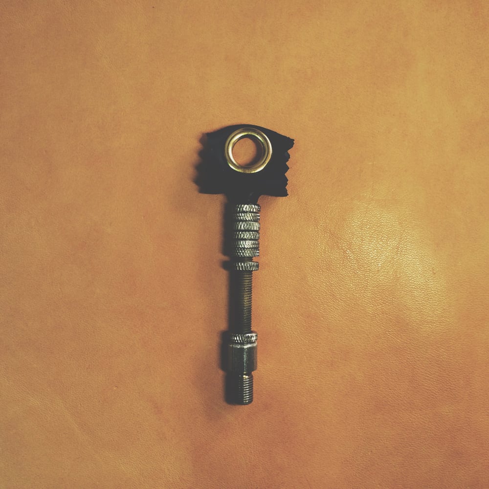 Image of Presta valve adapter key