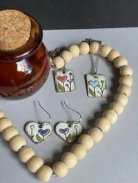 Image 1 of Triple Trinkets 
