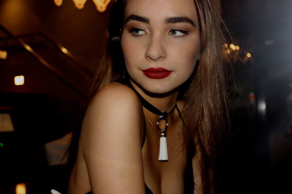 Image of Black band and hoop with White Tassel