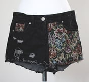 Image of Black denim shorts with tapestry style floral panel