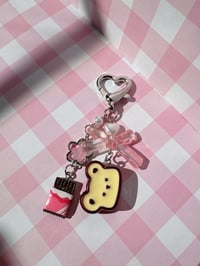 Image 1 of Kuma toast keychain 🍯