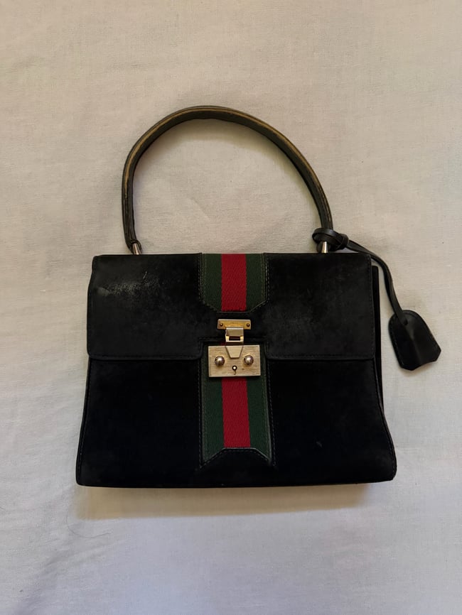 1970s Gucci italian leather handbag w lock and key
