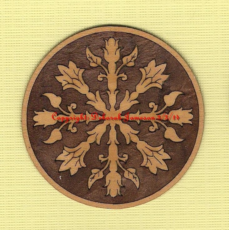 Image of Item No. 87 A or B.  Circular Seaweed Marquetry Motif from 2" up