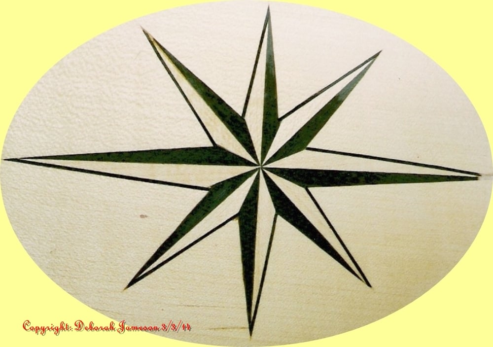 Image of Item No. 38.  Marquetry Inlay Nautical Star Design.