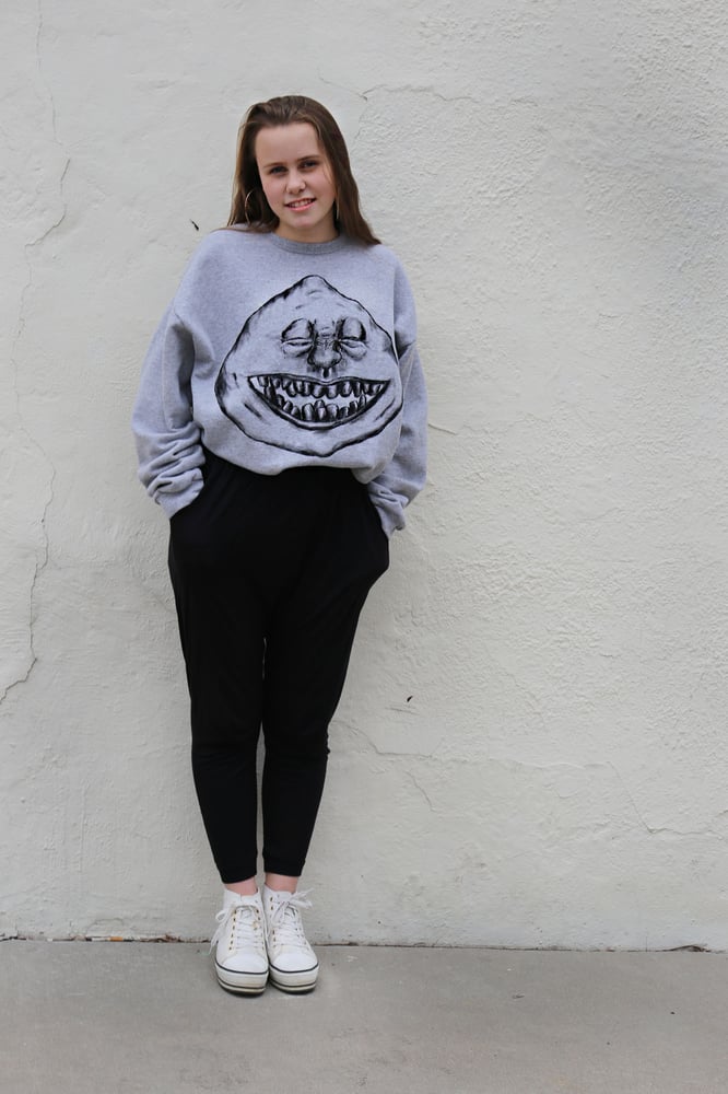 Image of black on grey crew-neck