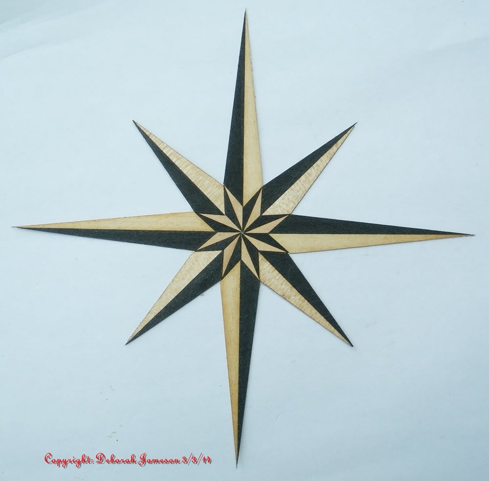 Image of Item No. 72. **HAND CUT**  Marquetry Inlay Nautical Compass Star.