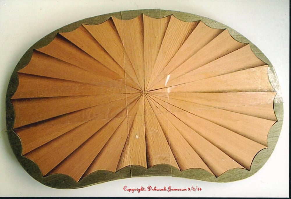 Image of Item 89.  Kidney Shaped Fan.