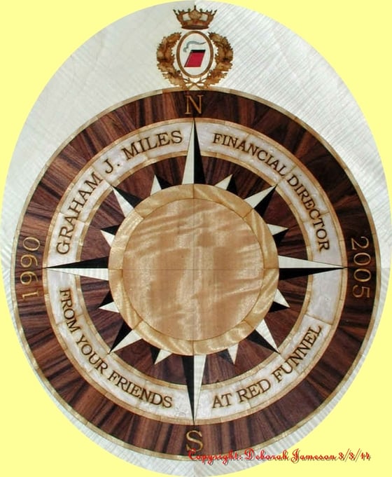 Image of Item No. 110.  PERSONALISED MARQUETRY INLAY NAUTICAL COMPASS.