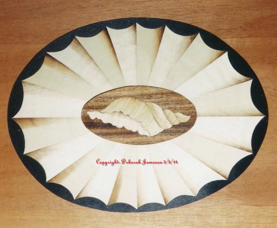 Image of Item No. 77. Shell In A Fan  design