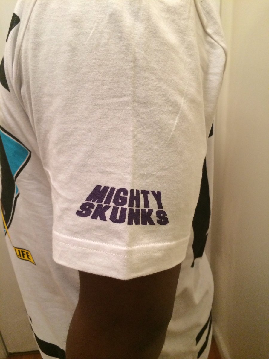 Image of *LIMITED EDITION WHITE "Mighty Skunks" HOCKEY TEE