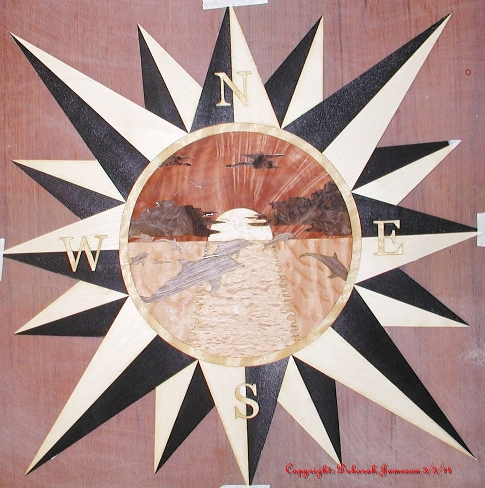 Image of Item No. 122. Star with Marquetry detail of a Lighthouse.
